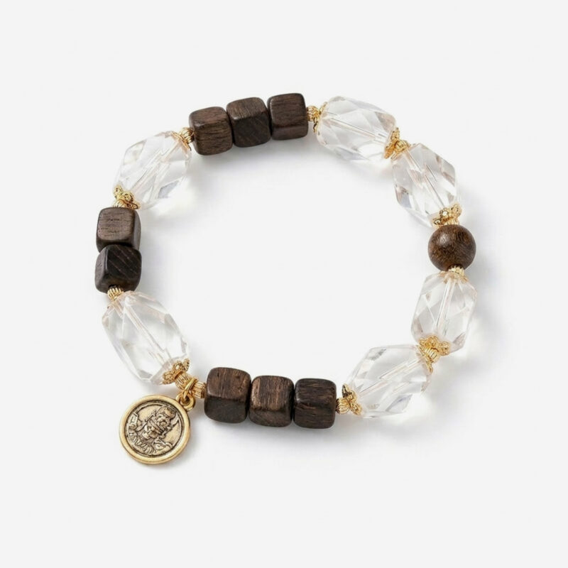 An agarwood clear quartz bracelet showcasing dark brown fragrant wood cubes, asymmetrical polished rock crystal elements, and a silver