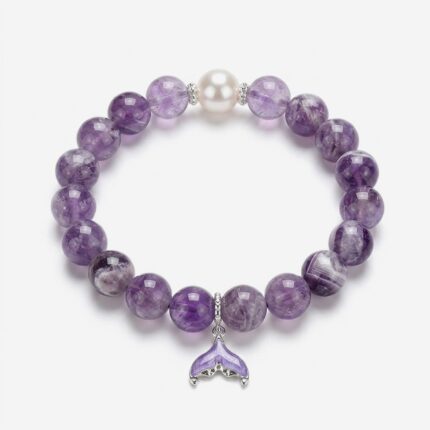 High-clarity amethyst mermaid tail bracelet showcasing 10mm chevron dream amethyst beads, a single white crystal pearl, and a purple enamel fin charm.