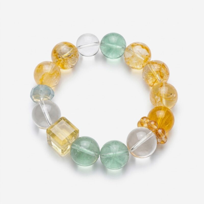 Premium natural citrine bracelet by Dewery showing large 15mm round yellow quartz beads, a golden sugar cube crystal, and green fluorite spheres on a white background.